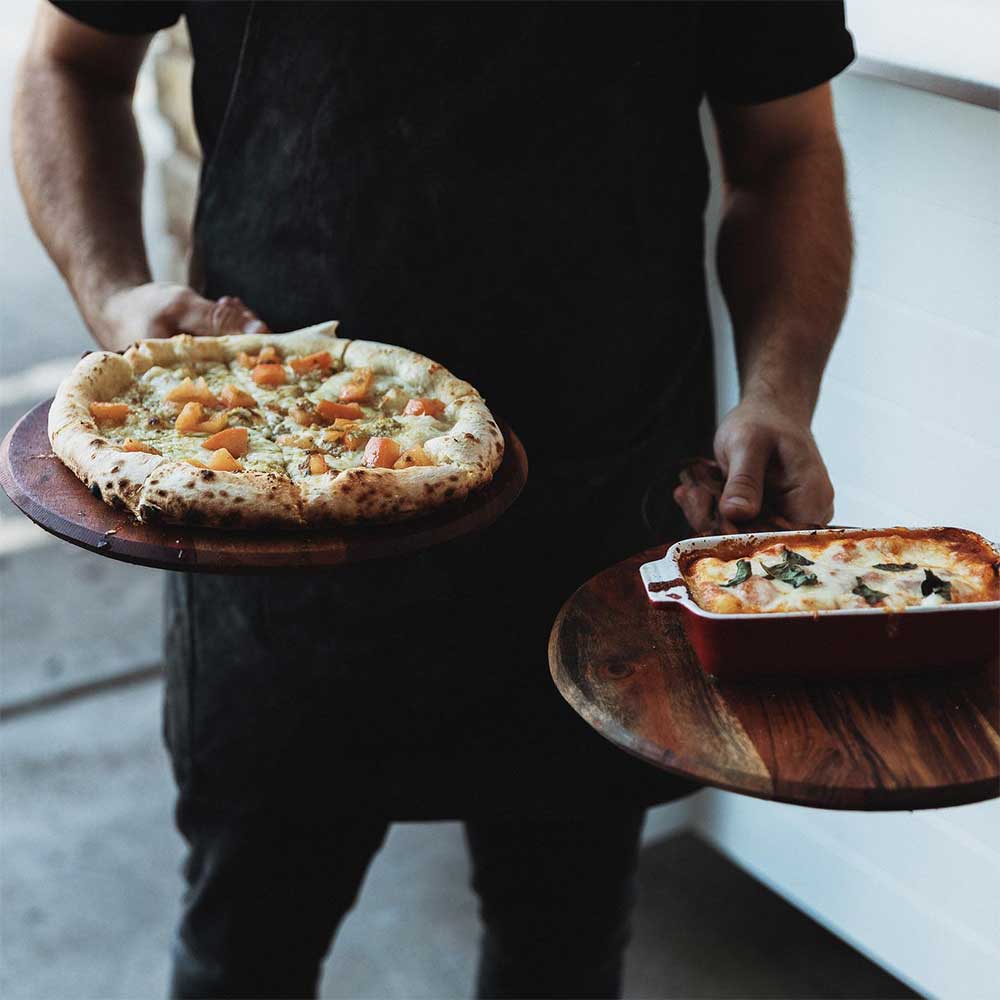 Fresh woodfire pizza at a Locale catered event